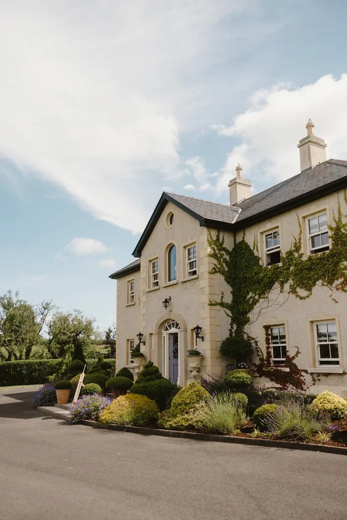 Front of Lavender Manor surrounded by established garden planting