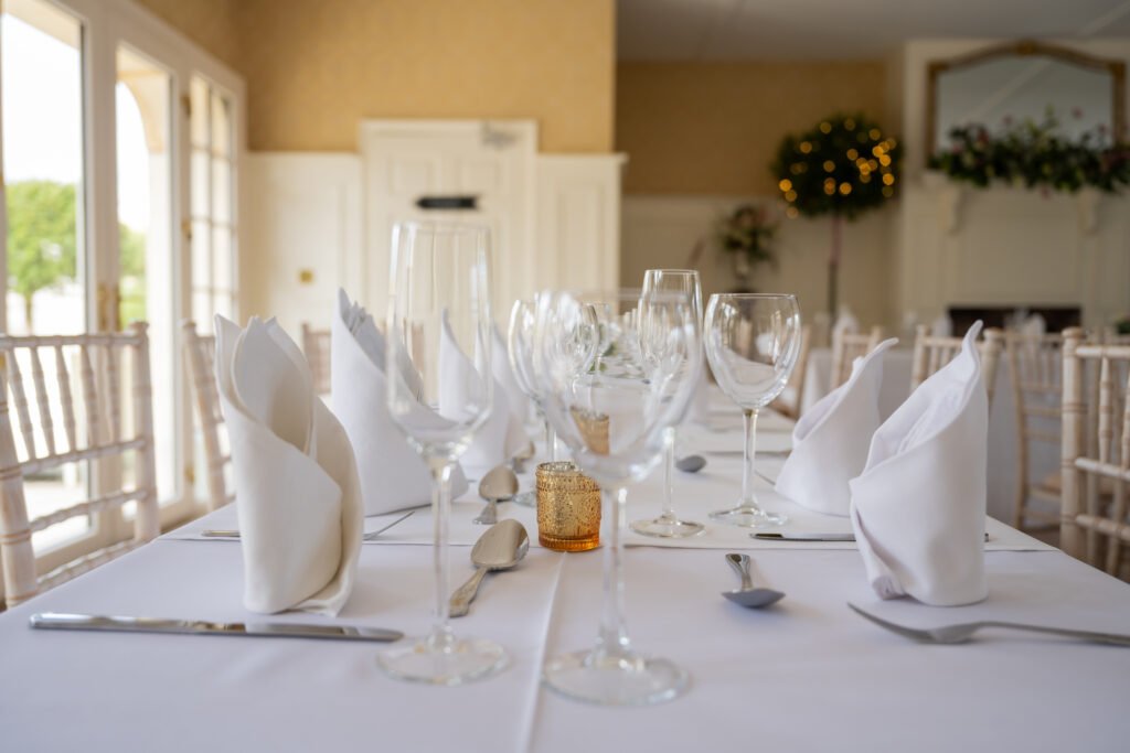Dining tables arranged for a private celebration at Lavender Manor