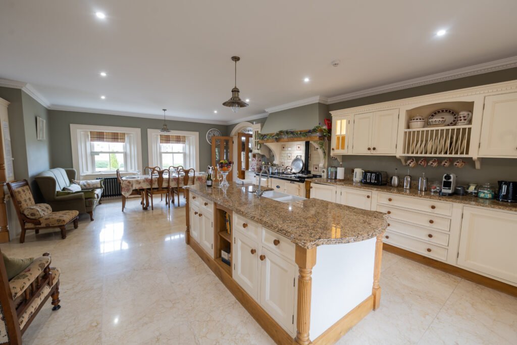 Large shared kitchen and dining space at Lavender Manor